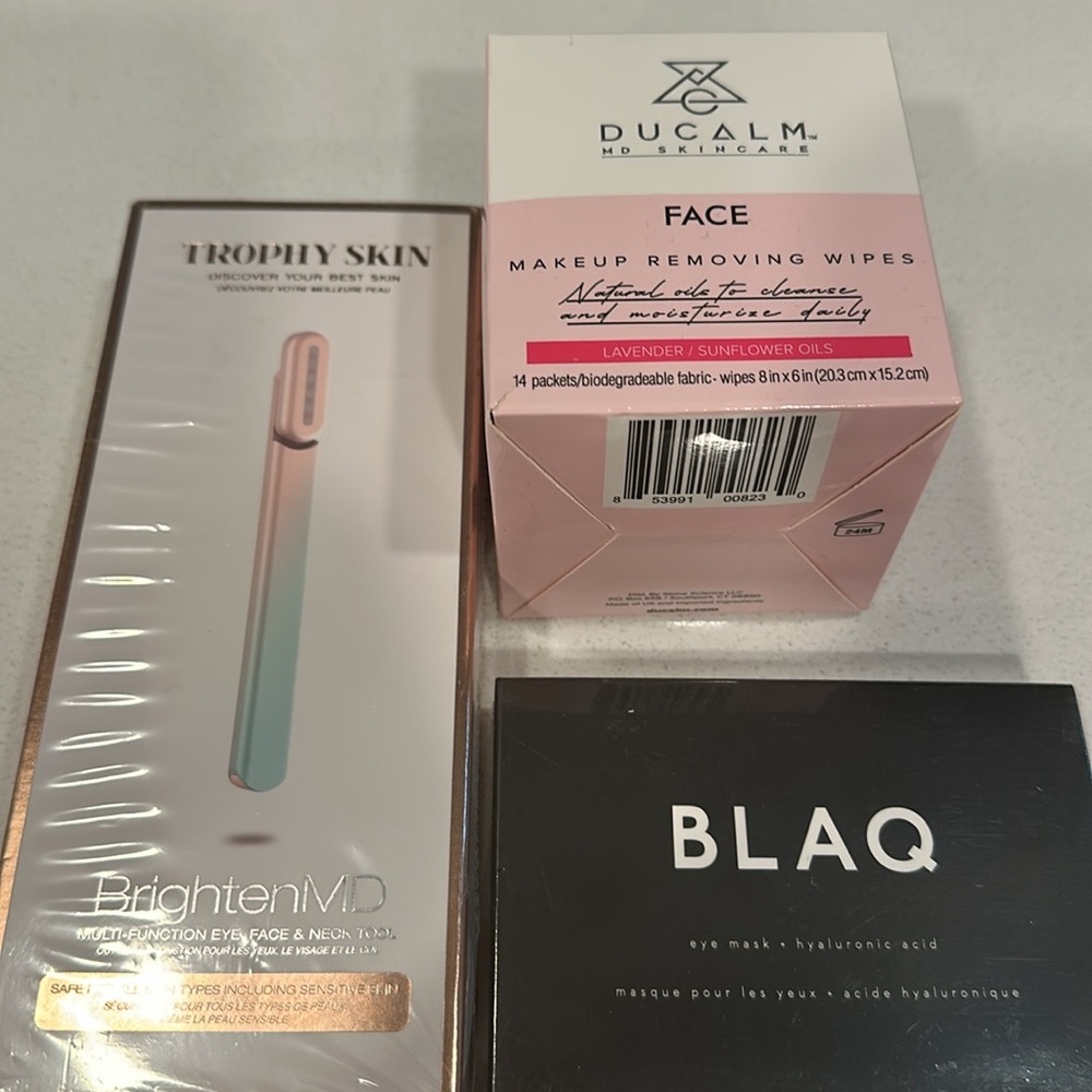Trophy Skin multi function tool, Blaq eye mask, and Ducalm make wipes